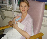 Anna with newborn